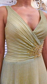 ABITO ORO CON GONNA PLISSETTATA