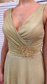 ABITO ORO CON GONNA PLISSETTATA