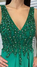 TUTA CON TOP IN CRISTALLI E PAILLETTES